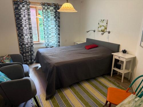 Llit o llits en una habitació de Borgholm Rum Centralt