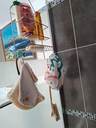 a bathroom with a cow toy on a counter at Merozzini in Moltifao