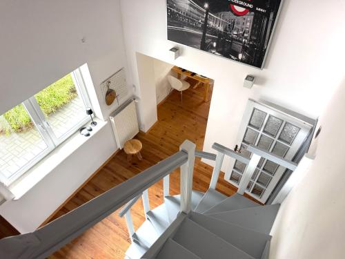 an overhead view of a staircase in a house at Dom Szalkowo Jeziorak Pavillon in Szałkowo