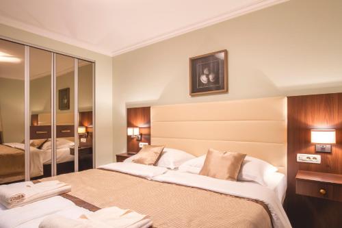 Postel nebo postele na pokoji v ubytování Luxury Apartments Villa Matea