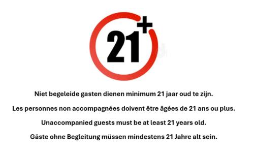 a sign with the number and a cross at Hotel Prins Boudewijn in Knokke-Heist