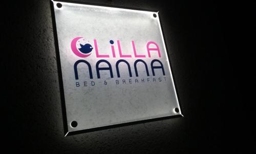 a sign on a wall with the name of a company at Lillananna Reload in Porto SantʼElpidio