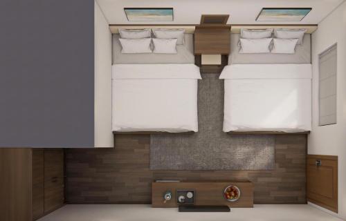 two bunk beds in a room with at Eco House Cat Ba in Hai Phong