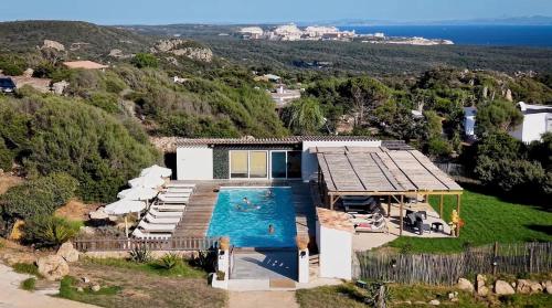 an aerial view of a house with a swimming pool at A Santa Trinita in Bonifacio