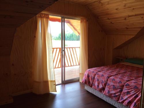 Posteľ alebo postele v izbe v ubytovaní Camping & Hospedaje Rio Laja