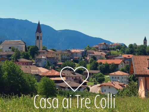 a town with a heart in front of a city at Casa ai Tre Colli, Tres in Tres