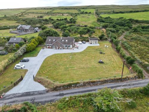 an aerial view of a house with a large yard at B&B Kerry Lakesview Lodge in Waterville