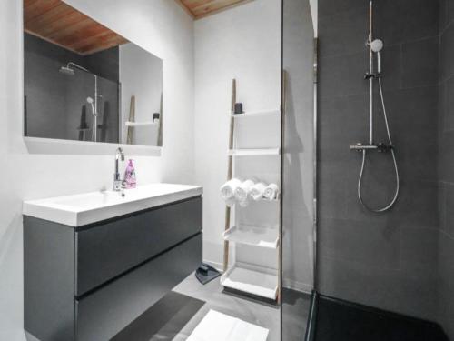 a bathroom with a sink and a shower at Seeglück am Pressegger See in Lake Pressegg