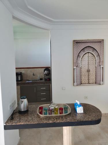 a kitchen counter with a tray of food on it at Rabat hassan in Rabat