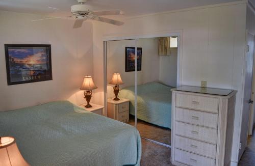 Ένα ή περισσότερα κρεβάτια σε δωμάτιο στο Hale Kai O'Kihei 301