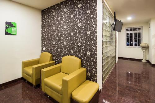 Un lugar para sentarse en Itsy Hotels Arastu Inn