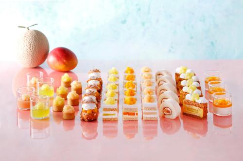 a bunch of different types of food on a table at Hotel New Otani Tokyo The Main in Tokyo