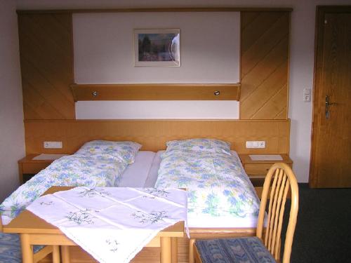 Postel nebo postele na pokoji v ubytování Haus Pinzger