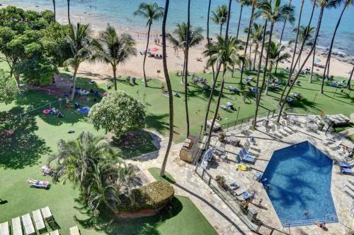 an aerial view of a resort with a swimming pool and a beach at Mana Kai 711C in Wailea