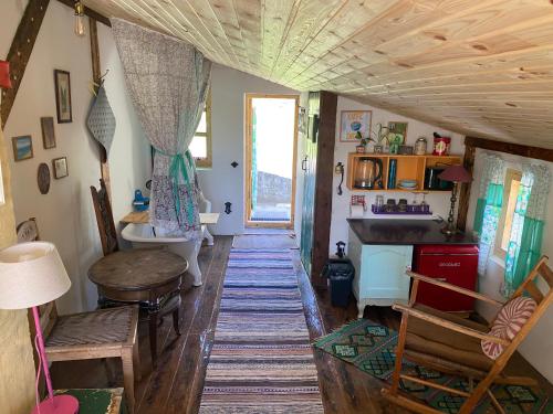 a hallway of a house with a sink and a table at Casa Ricardo in Svendborg