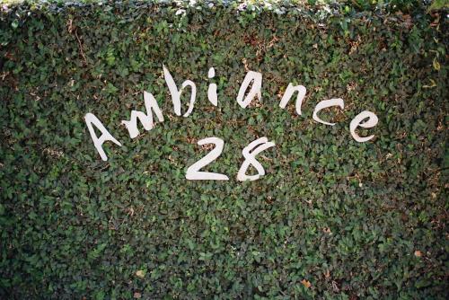 a sign that says amazonance written on a bush at Ambiance Guesthouse in Pretoria