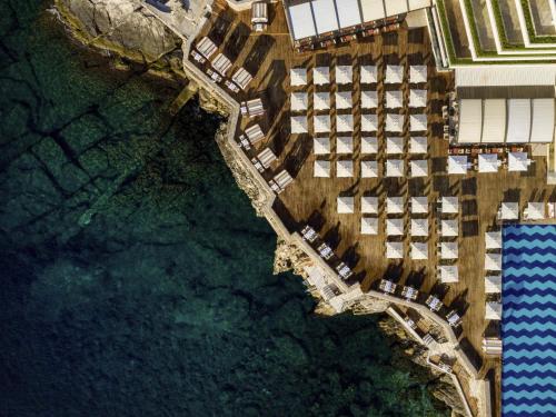 an aerial view of a resort with the ocean at Rixos Premium Dubrovnik in Dubrovnik