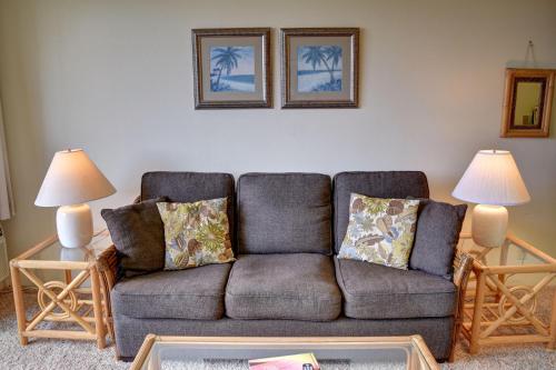 a living room with a couch and two lamps at Maui Vista 3205 in Kihei