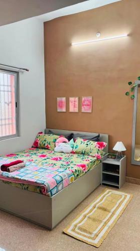 a bedroom with a bed in a room at priya inn royal in Lakhīmpur