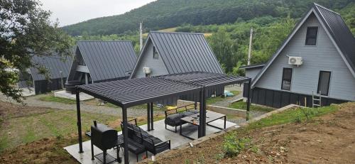 an overhead view of a house with a pavilion at E&T-Cabin A frame in Sibiu