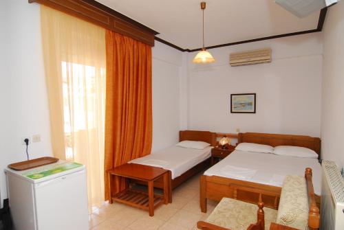 Postel nebo postele na pokoji v ubytování Hotel Venus
