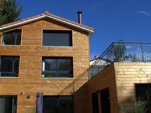 a brick house with a staircase on top of it at Effet Lodge in Saint-Cyr-au-Mont-dʼOr