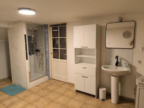 a bathroom with a sink and a shower at Sweet villa view 26 in Nyons