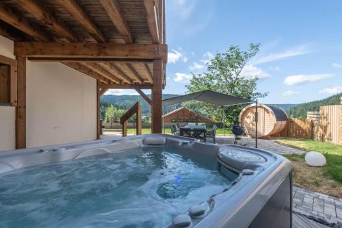 Chalet Le Carnotzet Luxury Chalet with Covered Hot Tub Panoramic Sauna