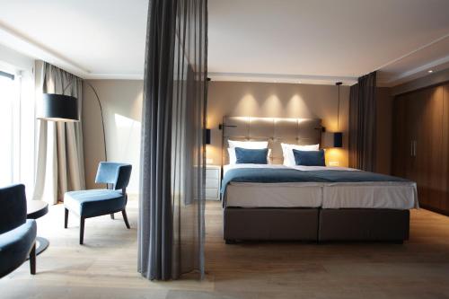 Кровать или кровати в номере Hotel Aurelia