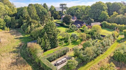 an aerial view of a house with a garden at Blackway House in Canon Frome