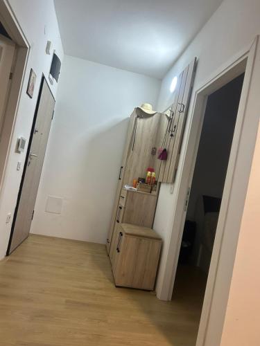 a staircase in a room with a stair case at Mila Todorovska in Star Dojran