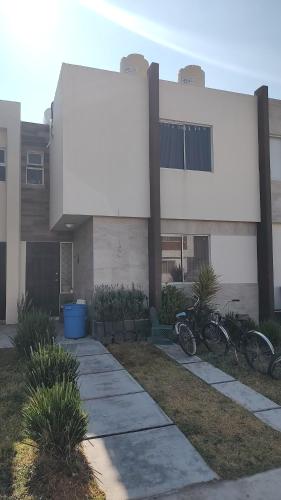 a building with bikes parked in front of it at Alojamiento el Toro in Gómez