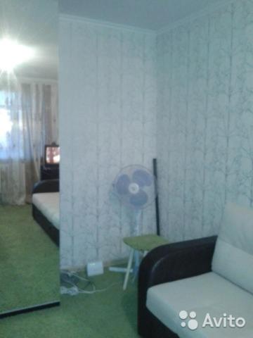 Uma área de estar em Apartment on Volgogradskaya