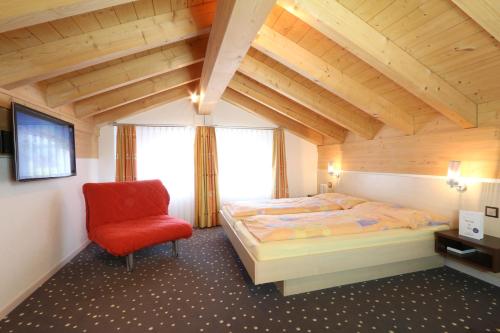 Кровать или кровати в номере Appartements Feehof