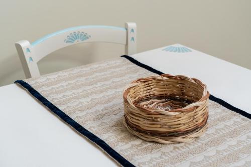 a basket sitting on top of a table at Su Chélu in Villasimius