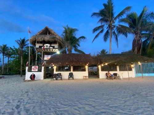 a restaurant on the beach at night at El Rincón de Juan in San Onofre