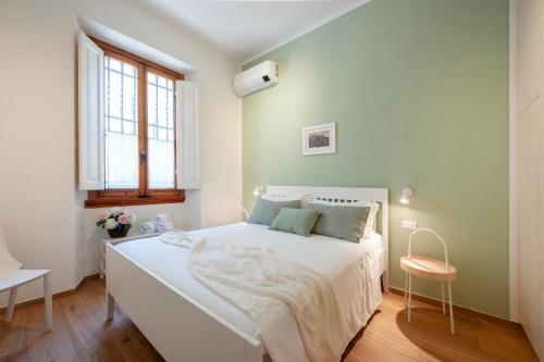 Luminoso Appartamento con Giardino e Terrazza Privati - 2 Camere - Parcheggio Comodo