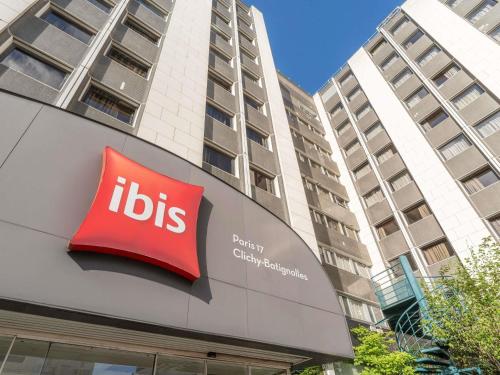 aubs sign on the side of a building at ibis Paris 17 Clichy-Batignolles in Paris