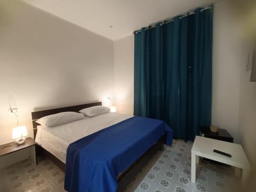 Llit o llits en una habitació de La Rosa