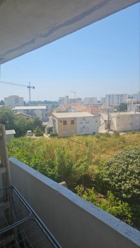 a view of a city from a balcony at Apartman Andrej in Bar