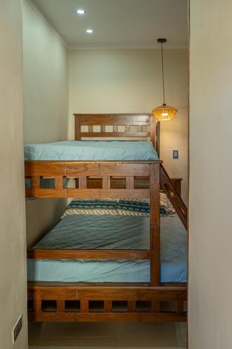 a couple of bunk beds in a room at Casita Vera Style in Tarija