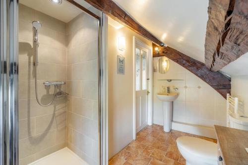 a bathroom with a shower and a sink at 1 Bed in Hawkshead oc-lr072 in Hawkshead