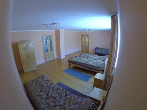 Postel nebo postele na pokoji v ubytování Садиба На лужку