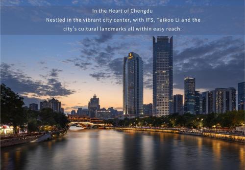 a city with a river in the foreground in the downtown city center at Shangri-La Chengdu in Chengdu