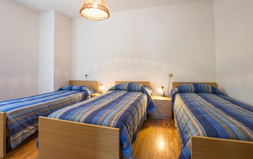 Кровать или кровати в номере Casa Oasi