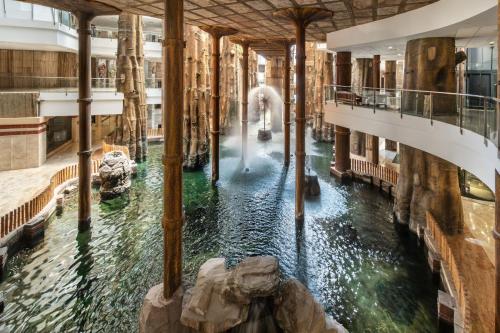 a view of a water fountain in a building at Holiday World Polynesia, Affiliated by Meliá in Benalmádena
