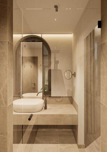 a bathroom with a sink and a mirror at Terra Saar, Weinresort & Spa in Saarburg