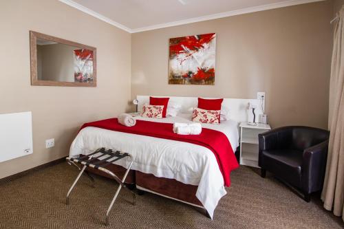 מיטה או מיטות בחדר ב-The Blue Lotus Guest House