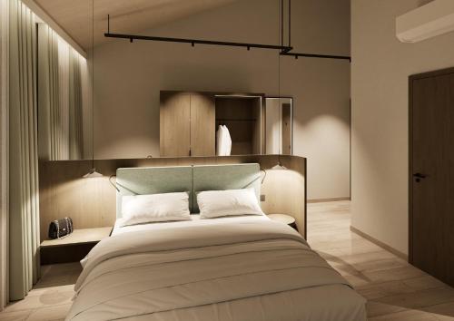 a bedroom with a large bed in a room at Terra Saar, Weinresort & Spa in Saarburg