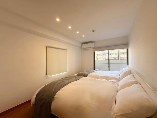 Tokaichi BLD by b hotel - Cozy 2BR Apartment Short Walk to Peace Park